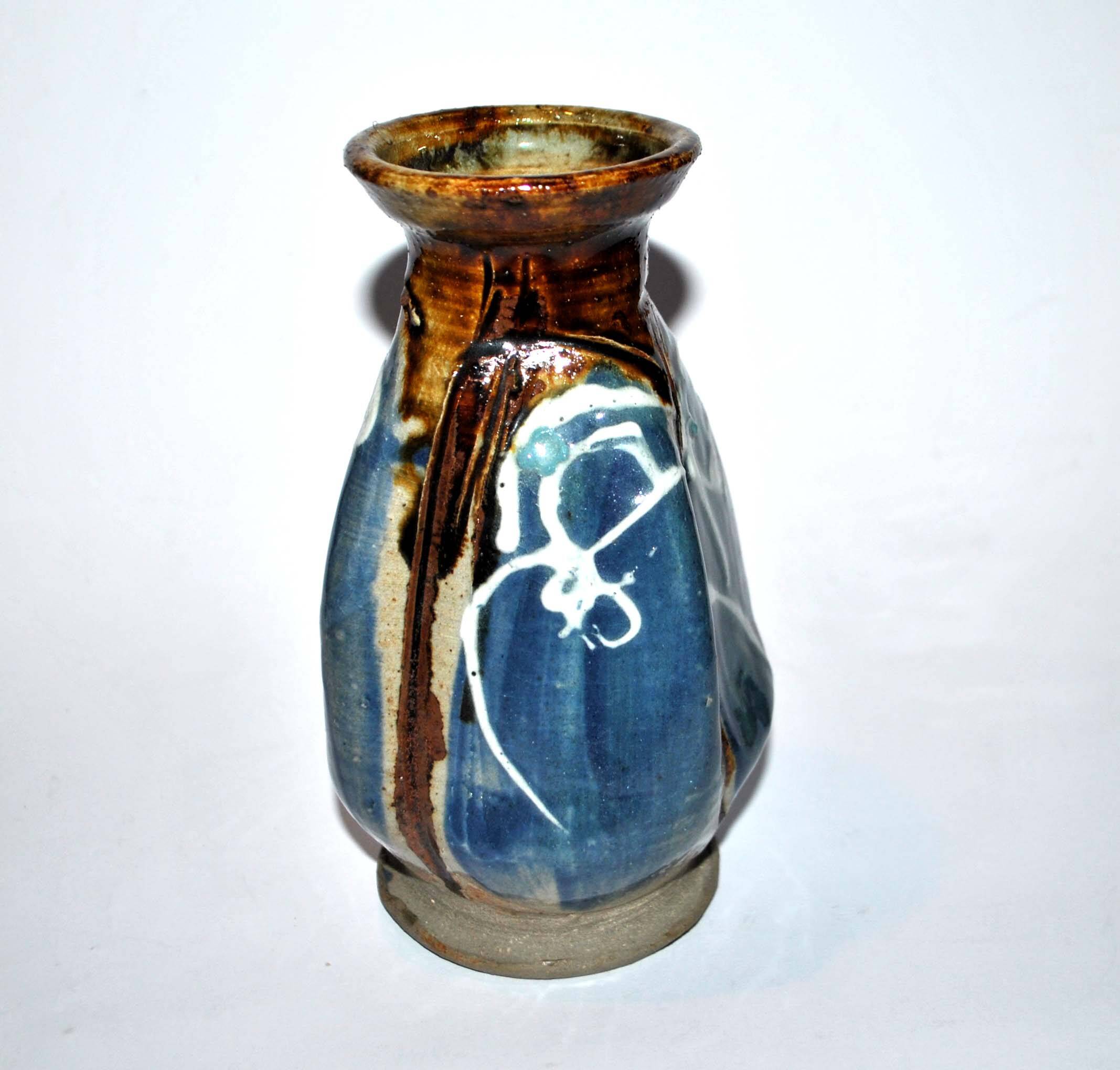 Old ceramic vase signed