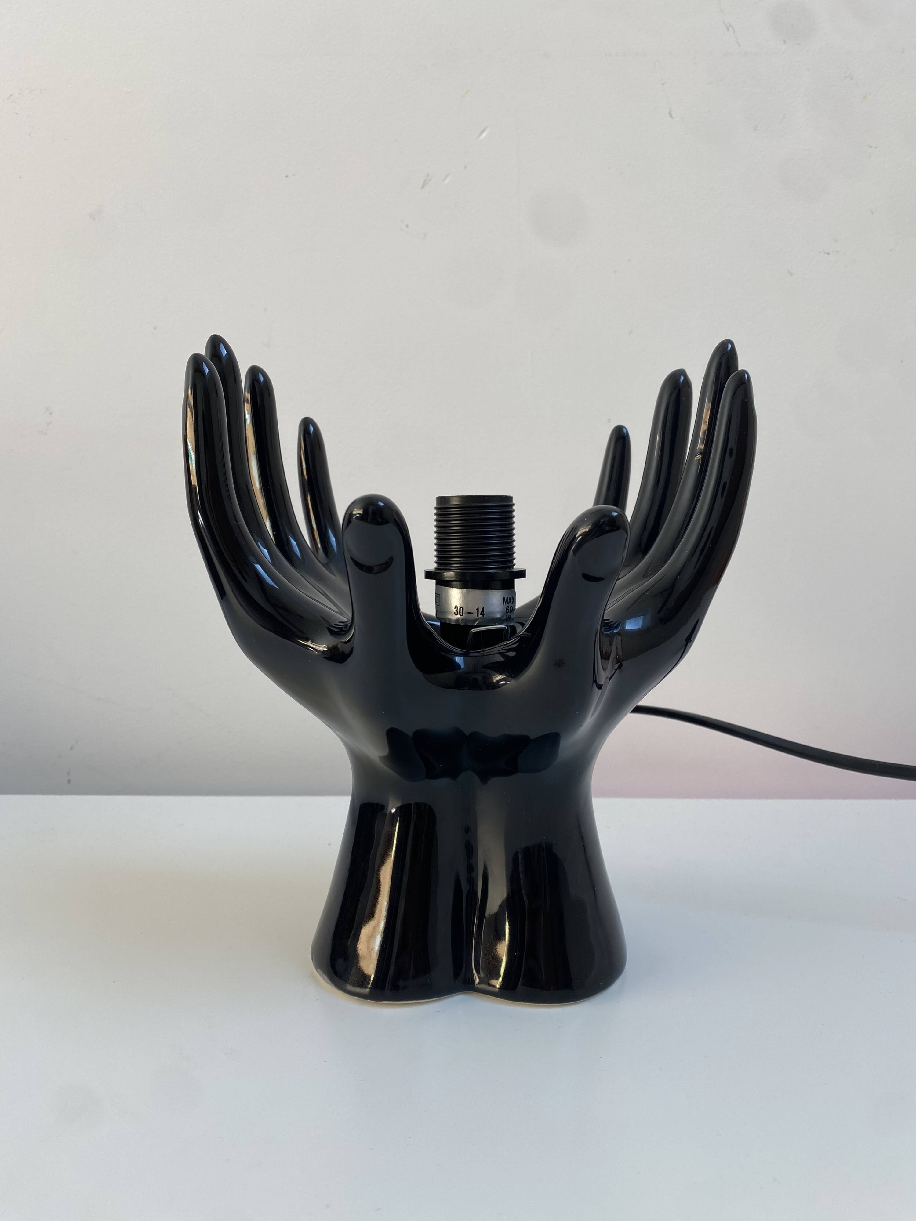 Sculpted ceramic globe lamp.