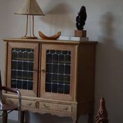 20th-century mid-century solid oak sideboard with glass front, by a Danish cabinetmaker.