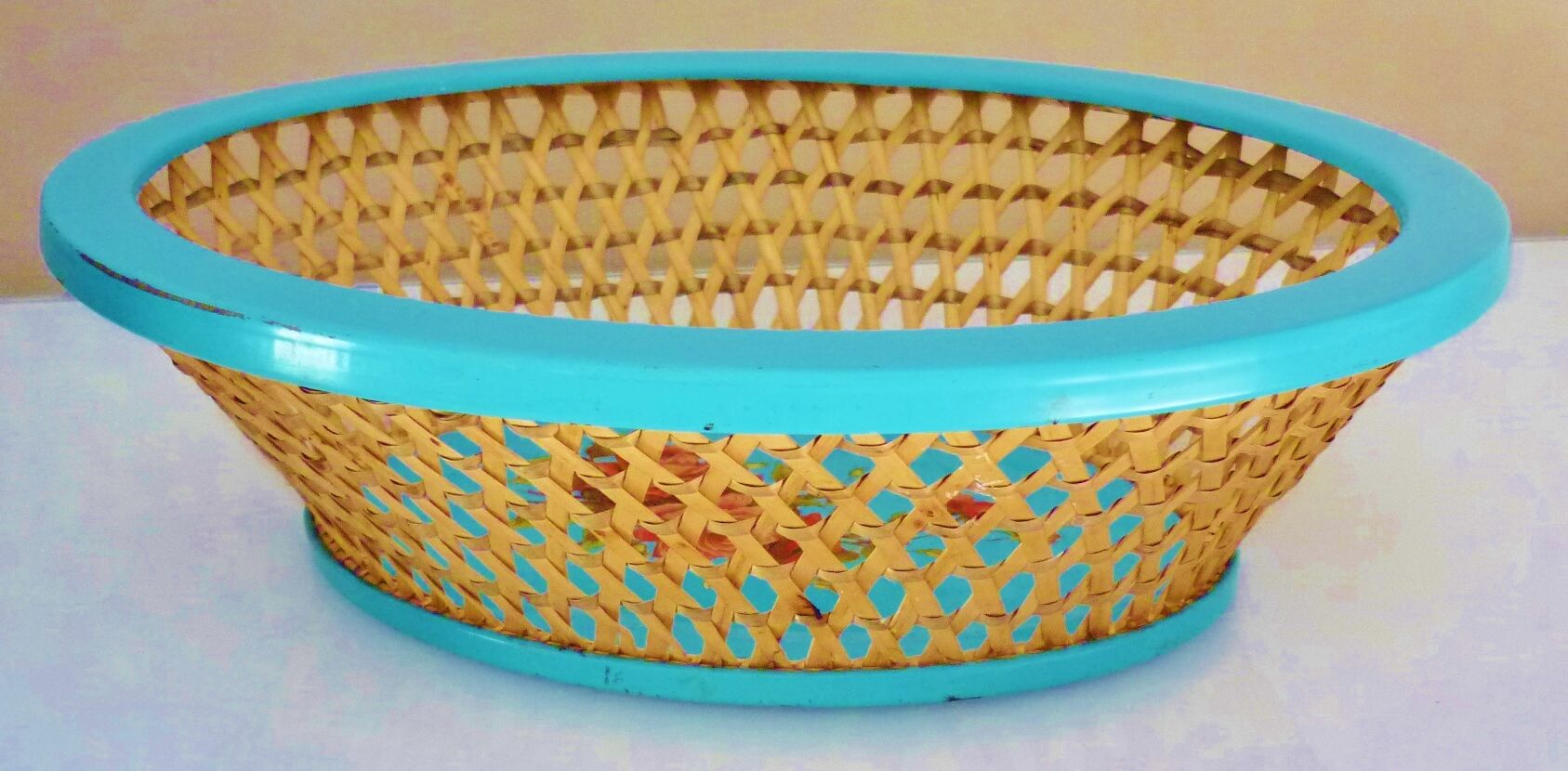 Antique basket in painted sheet metal and woven wicker, decorated with roses