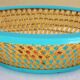 Antique basket in painted sheet metal and woven wicker, decorated with roses