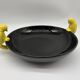 Large vintage black ceramic bowl with yellow parakeets, Vallauris.