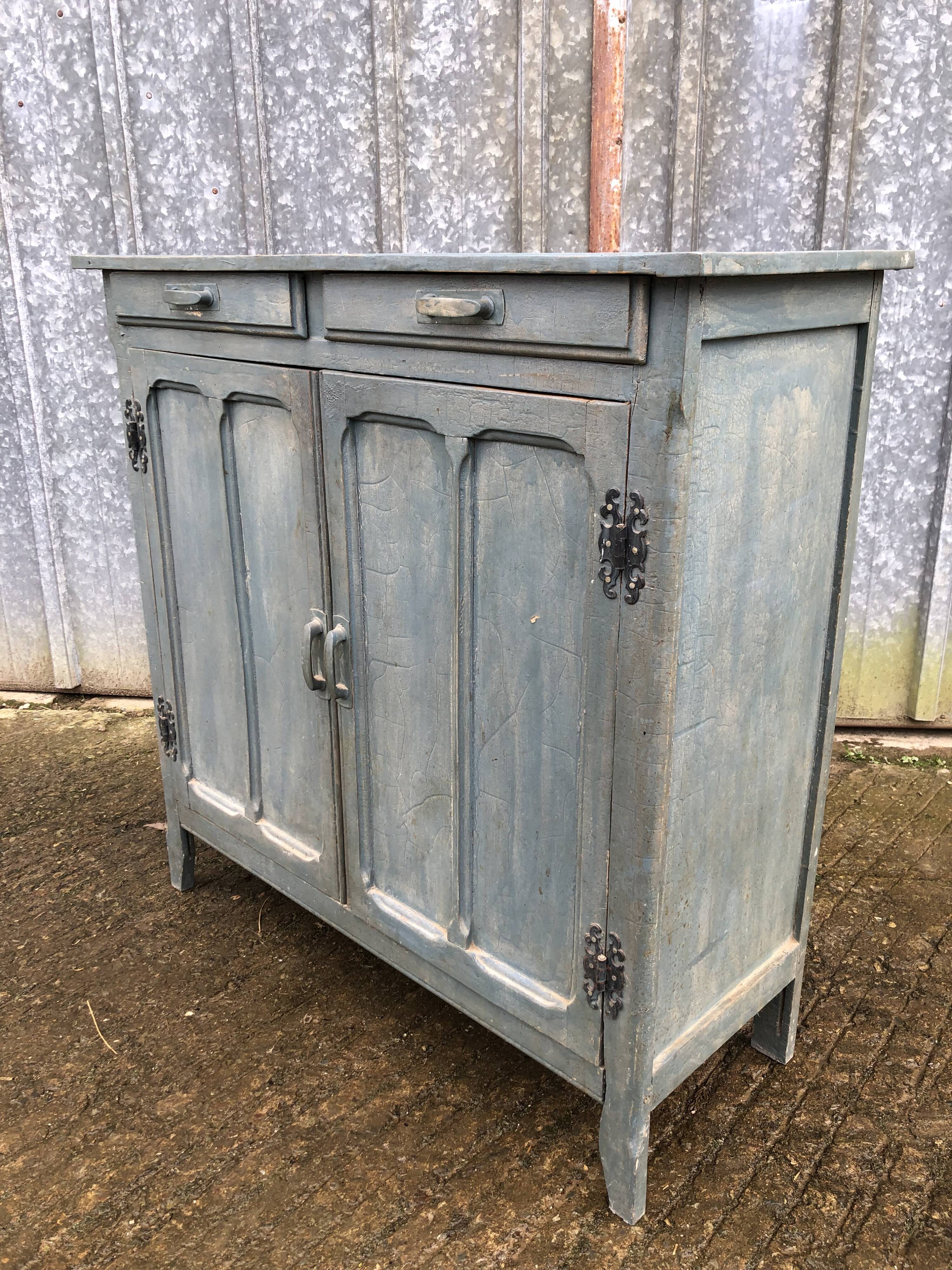 Parisian sideboard painted in blue with 2 doors and 2 drawers.