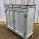 Parisian sideboard painted in blue with 2 doors and 2 drawers.