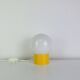 Space Age ball lamp, opaline with a yellow base, 1960s.