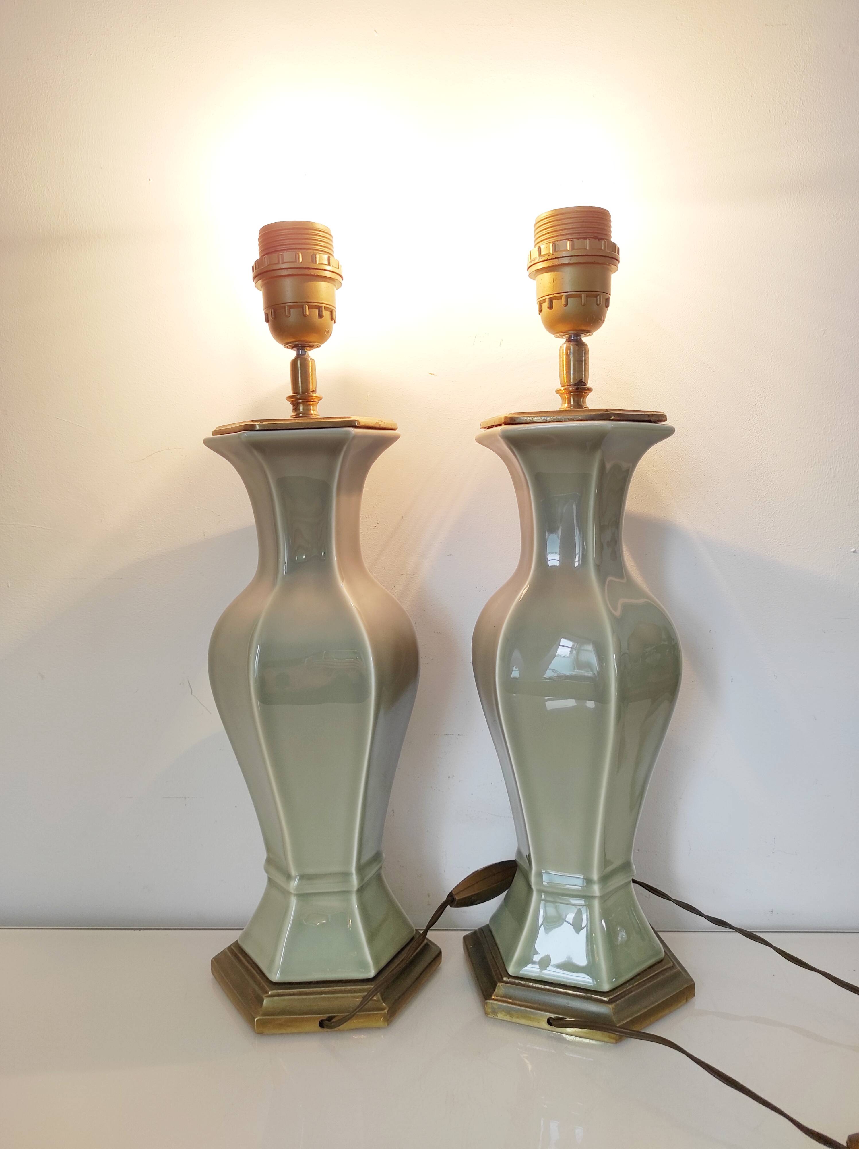 Two celadon-colored ceramic lamp bases