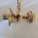 Duo of brass balance wall candle holders