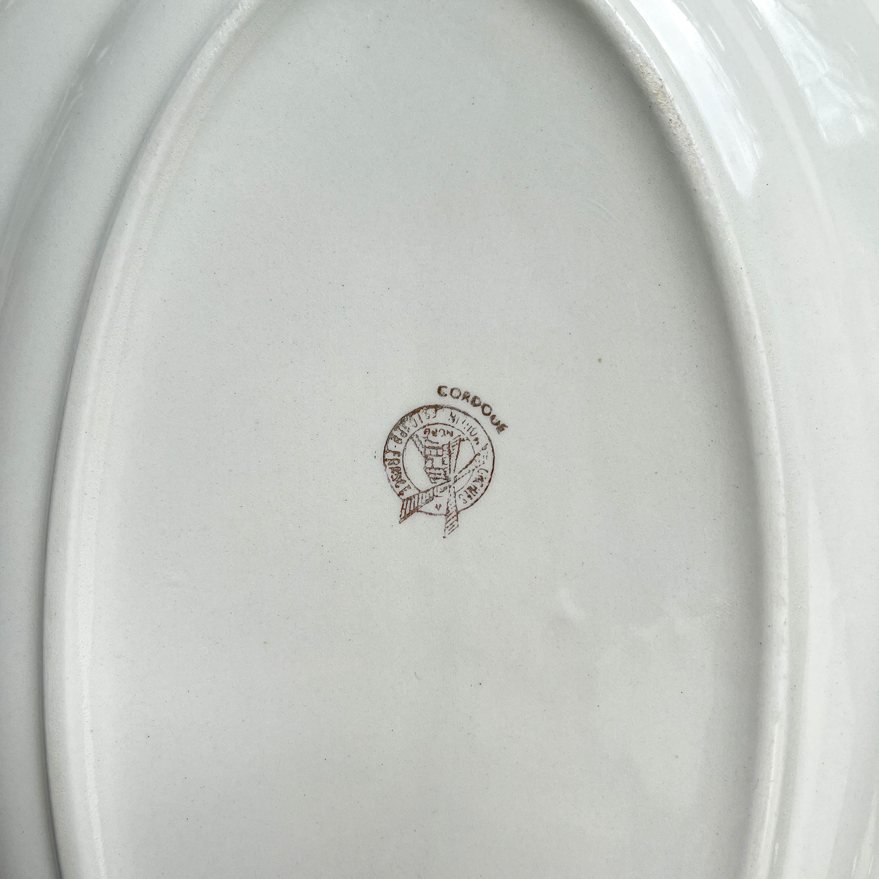Vintage oval dish in flowered earthenware Moulin des Loups model "Cordoba"