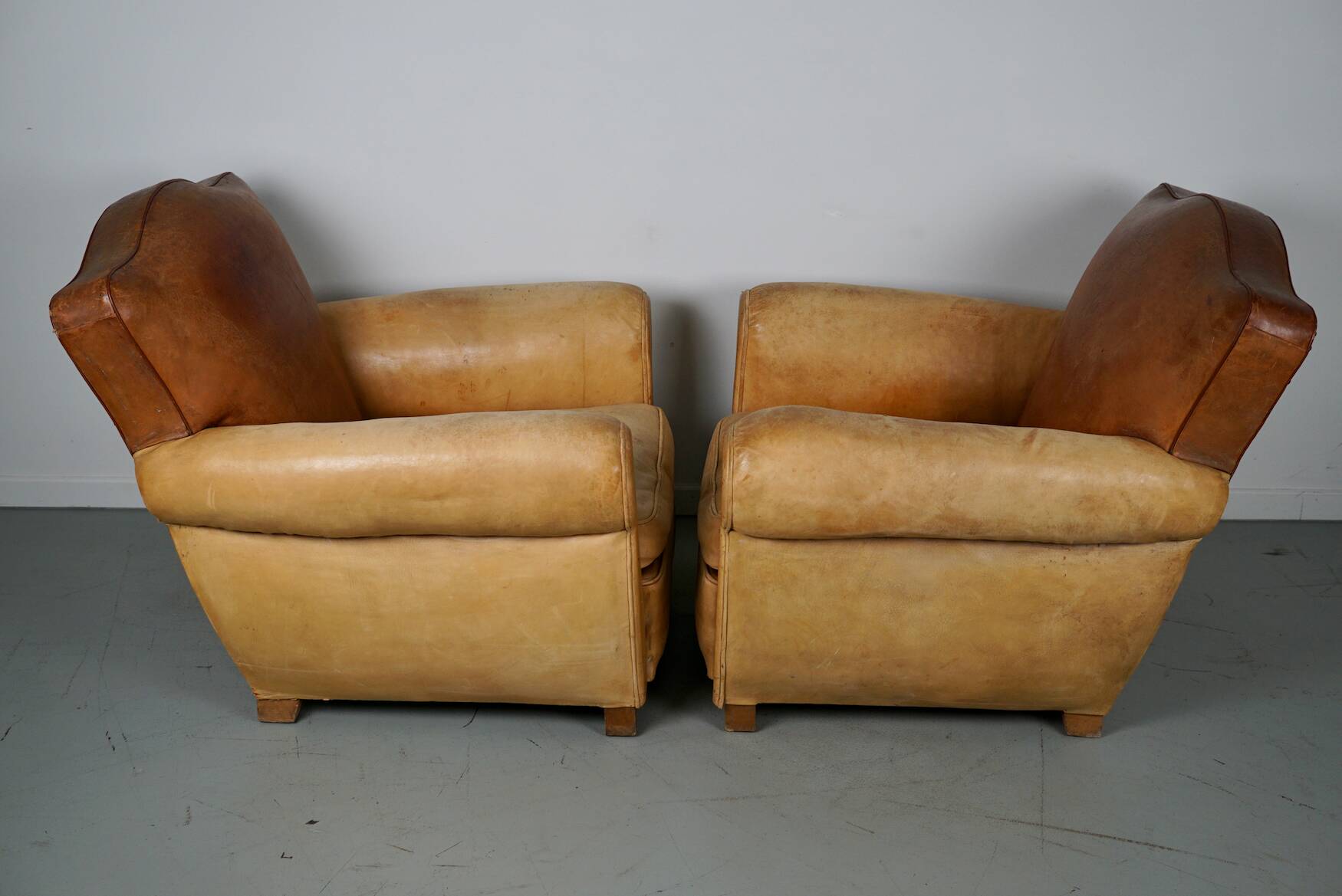 Pair of French Cognac Moustache Back Leather Club Chairs, 1940s