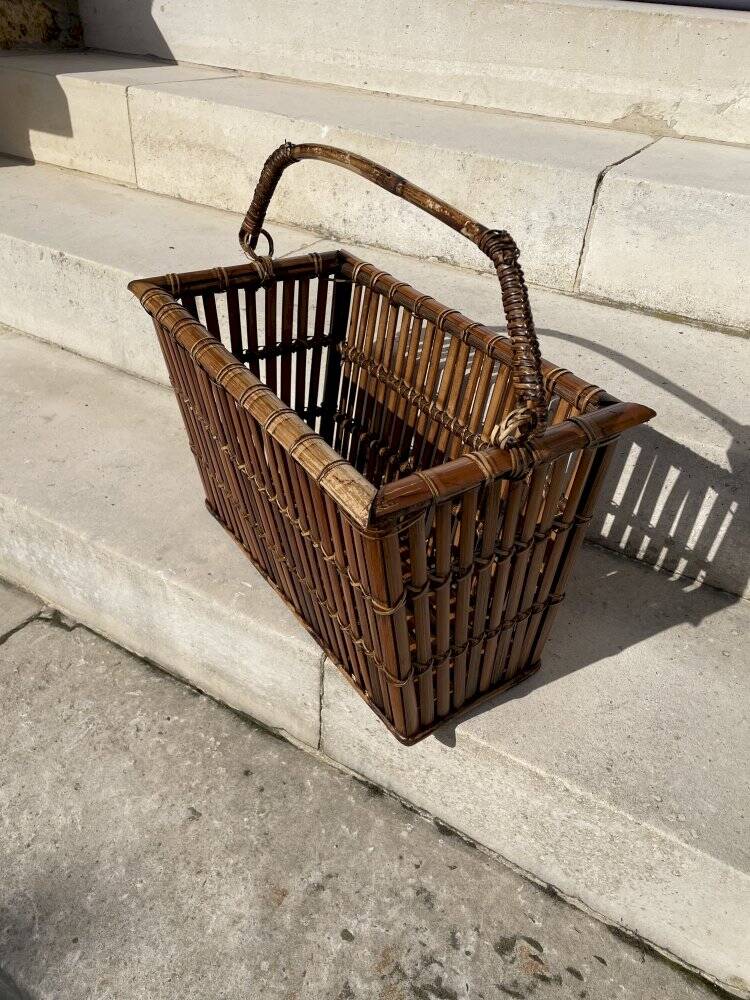 Brown wicker/rattan basket-shaped magazine rack