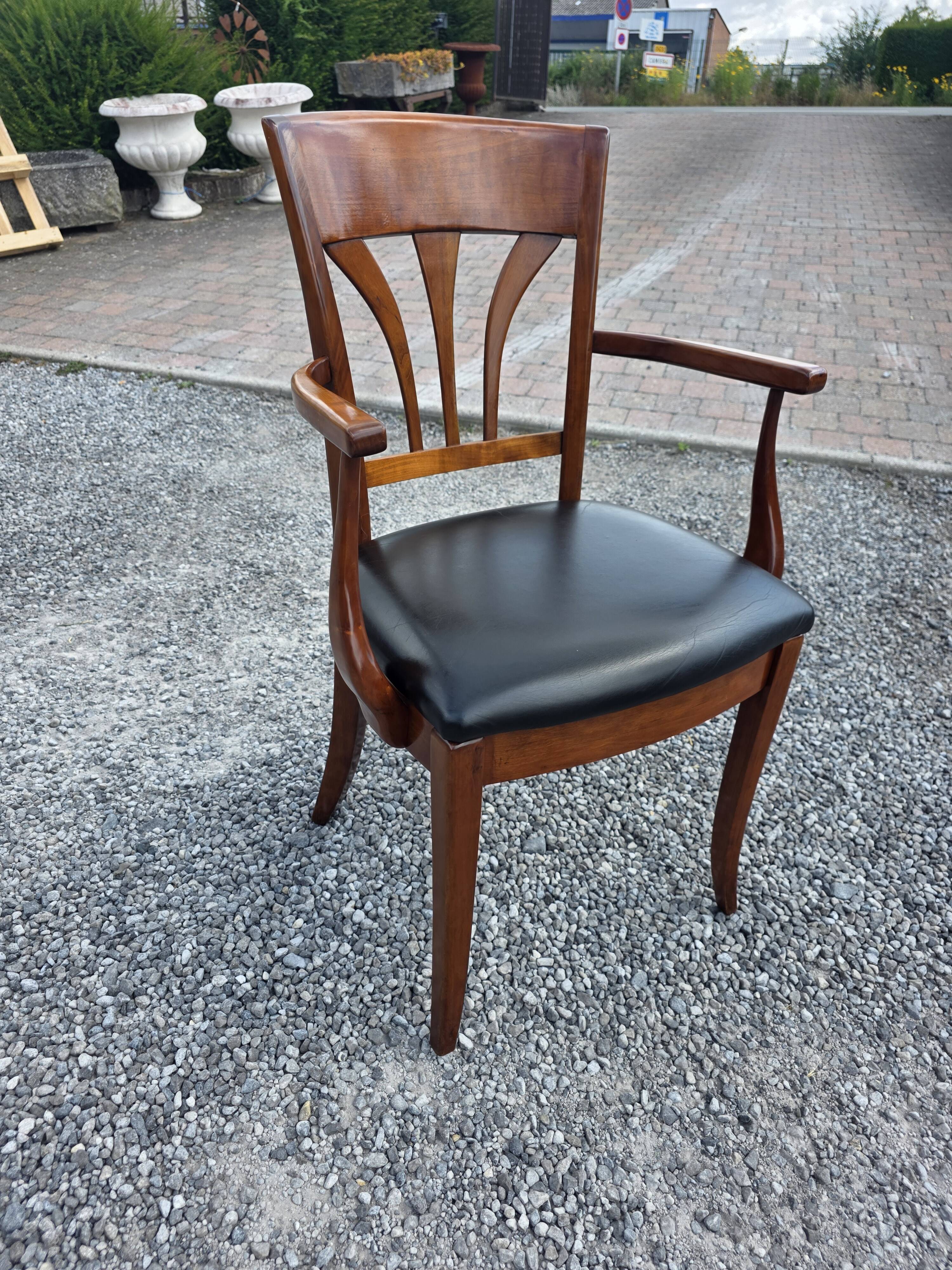 Mid-20th century solid cherry wood office chair.