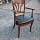 Mid-20th century solid cherry wood office chair.
