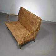 Vintage French papercord sofa with a metal frame base