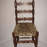 Old chair covered Leopard fabrics
