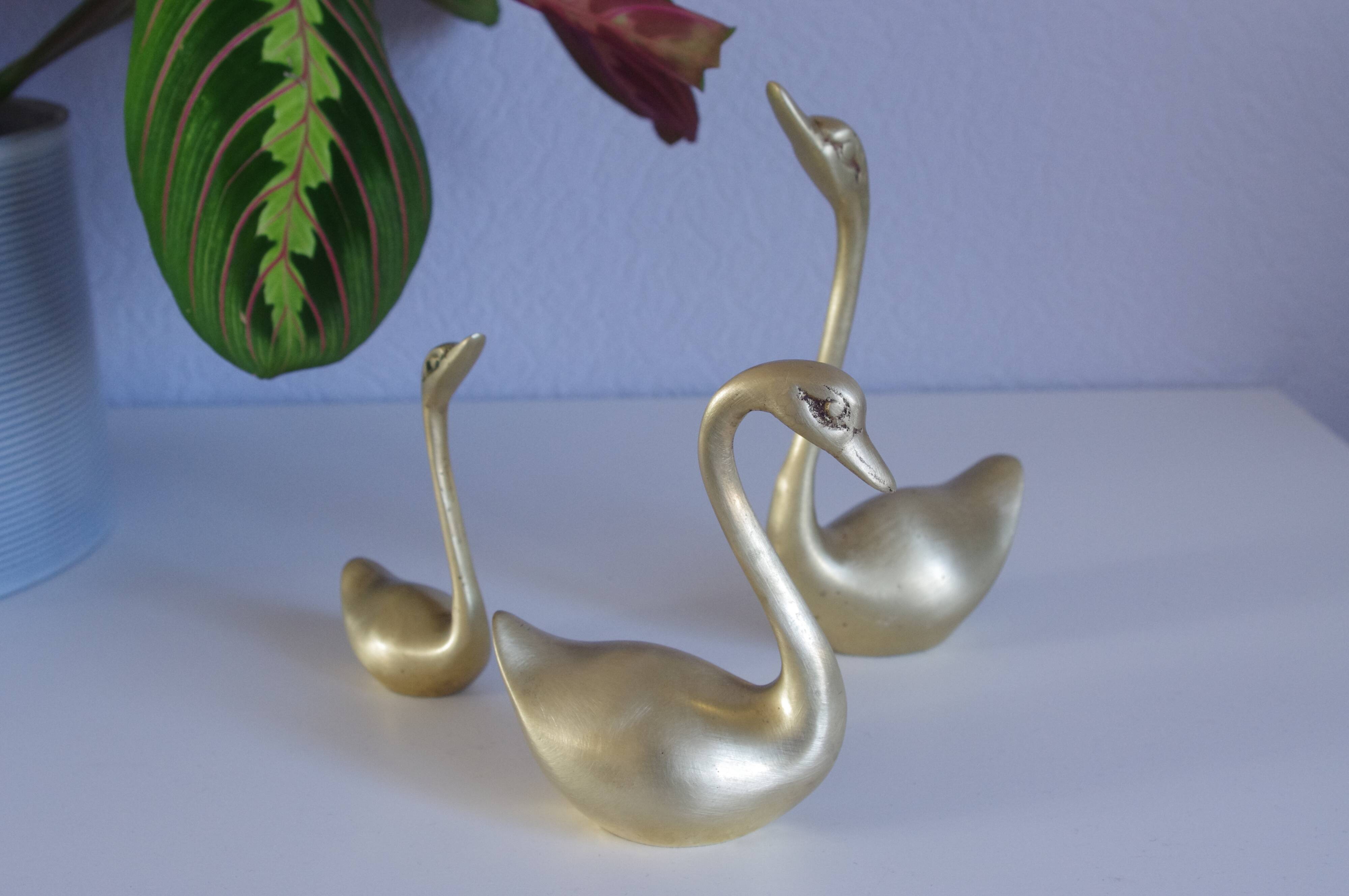 Swans or ducks brass