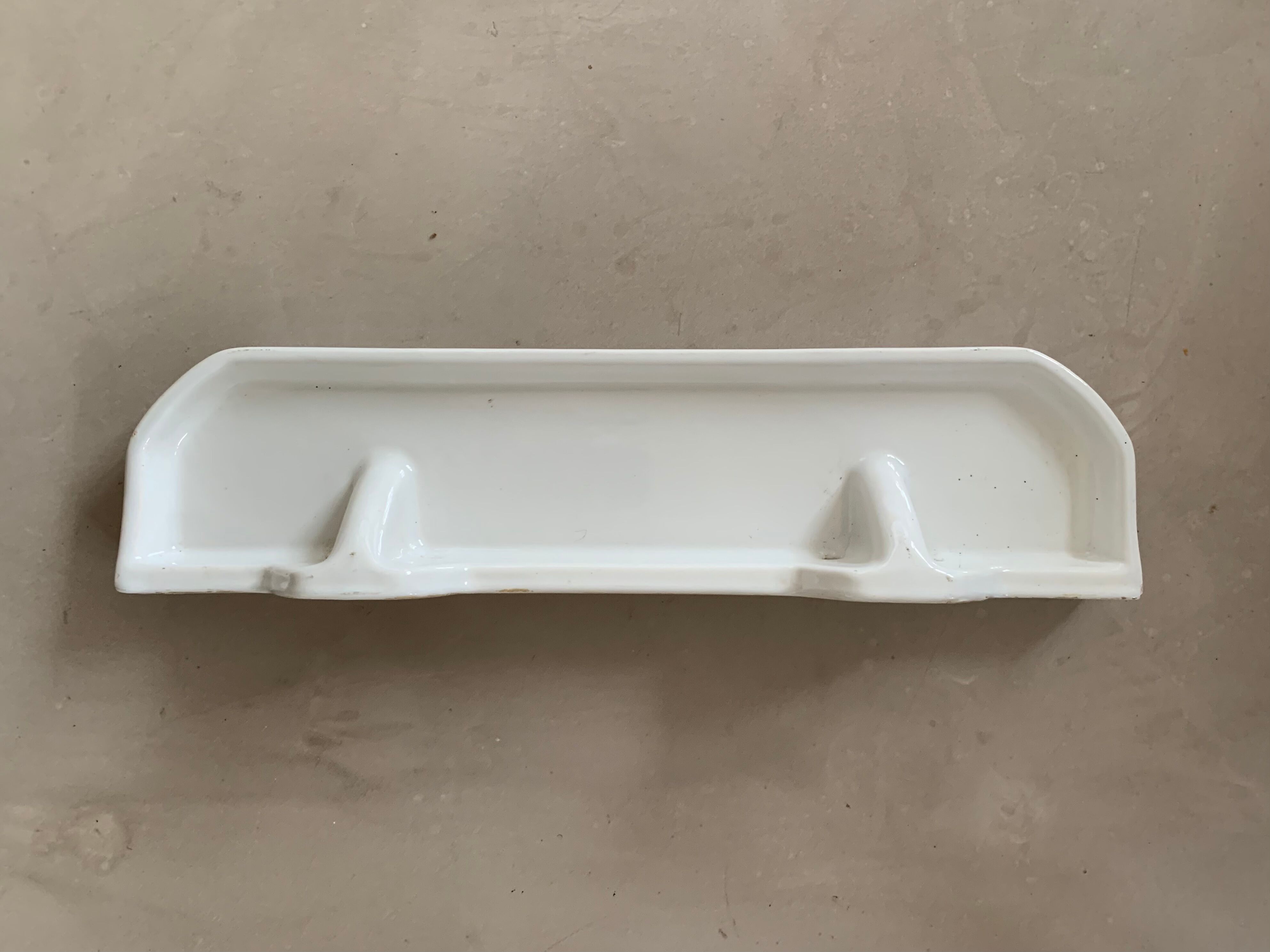 Antique ceramic wall shelf