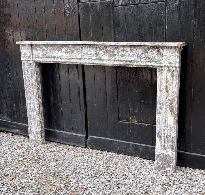 Louis XVI fireplace in grey Ardennes marble, late 18th century.