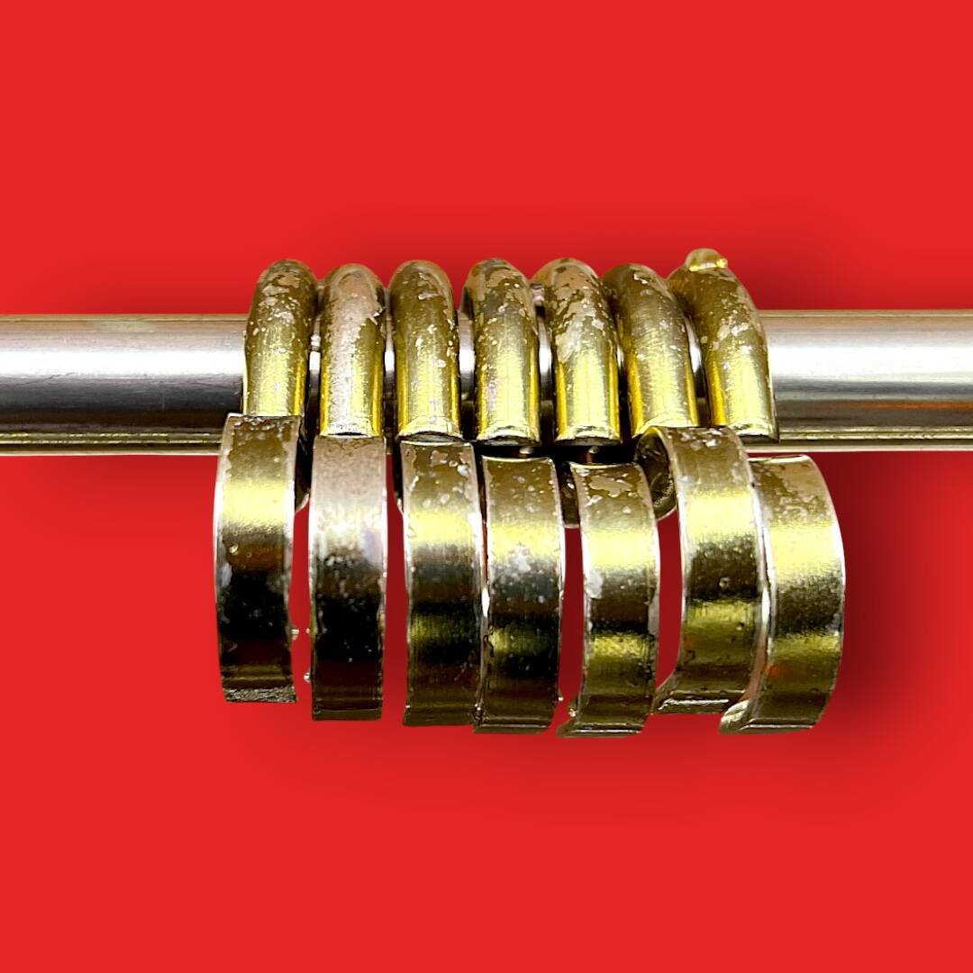 Vintage wall-mounted coat rack in black bakelite and brass – 1950s