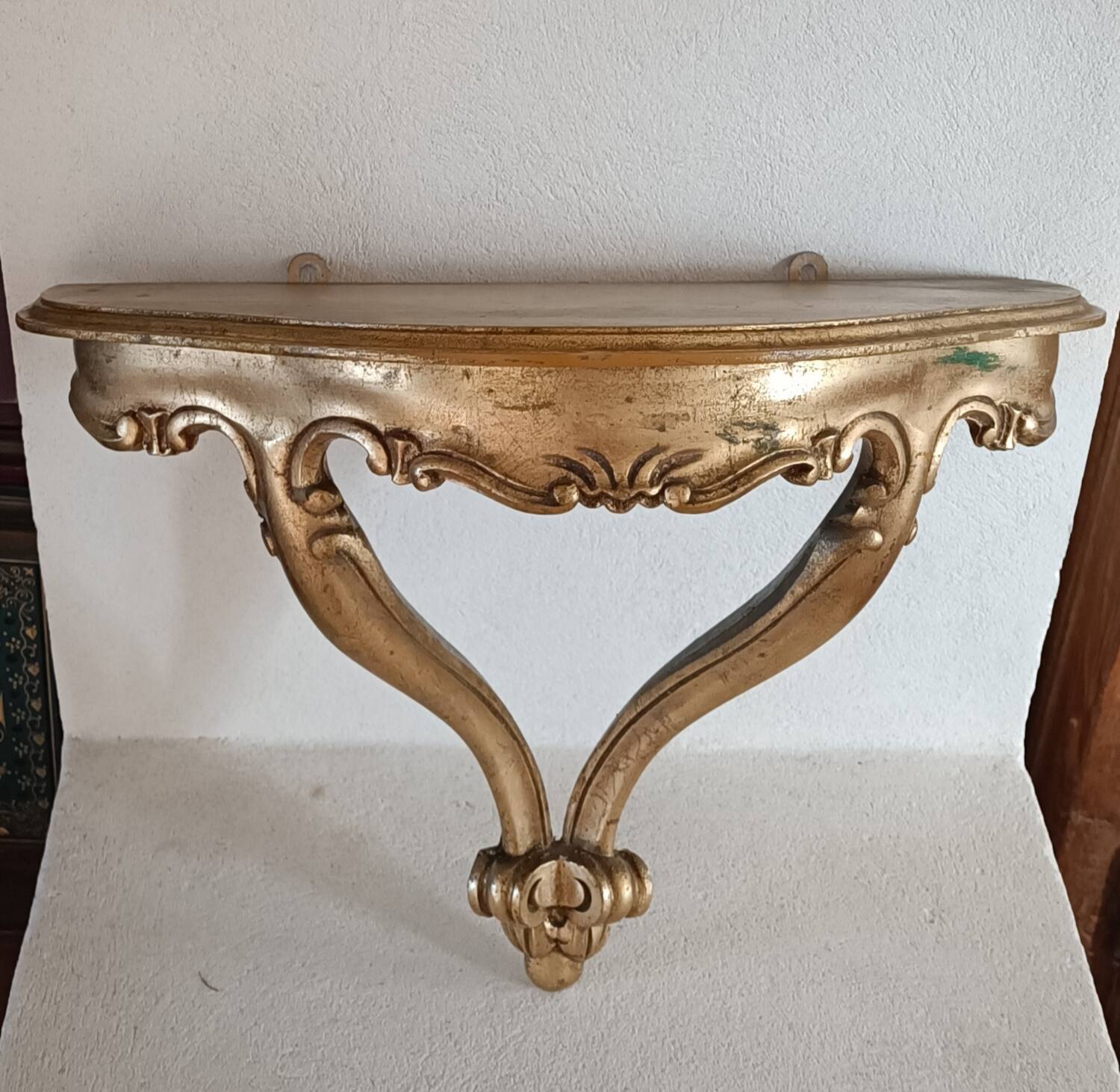 Golden wall console