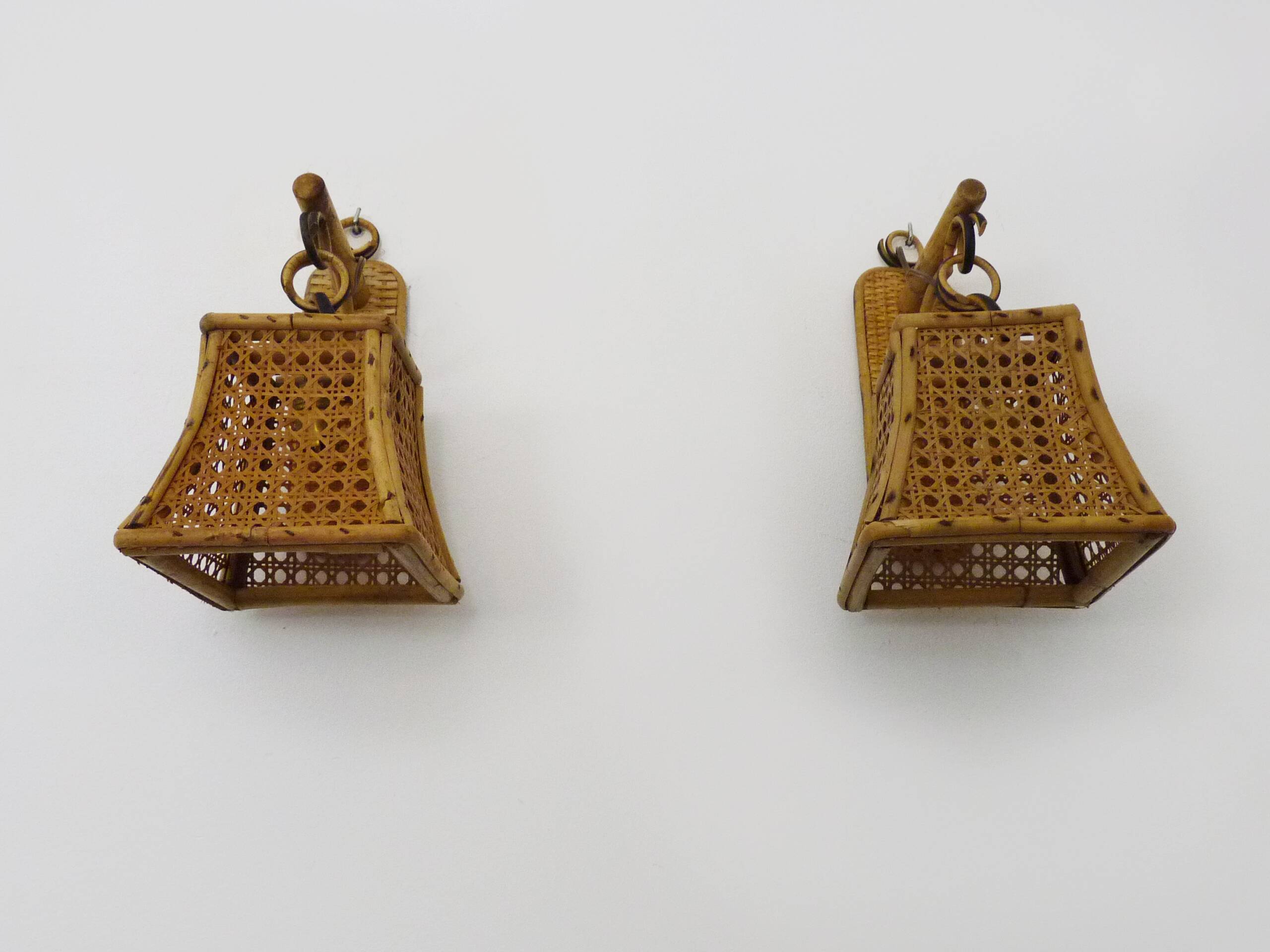 Pair of rattan and cane lantern wall lights. 1950s-1960s