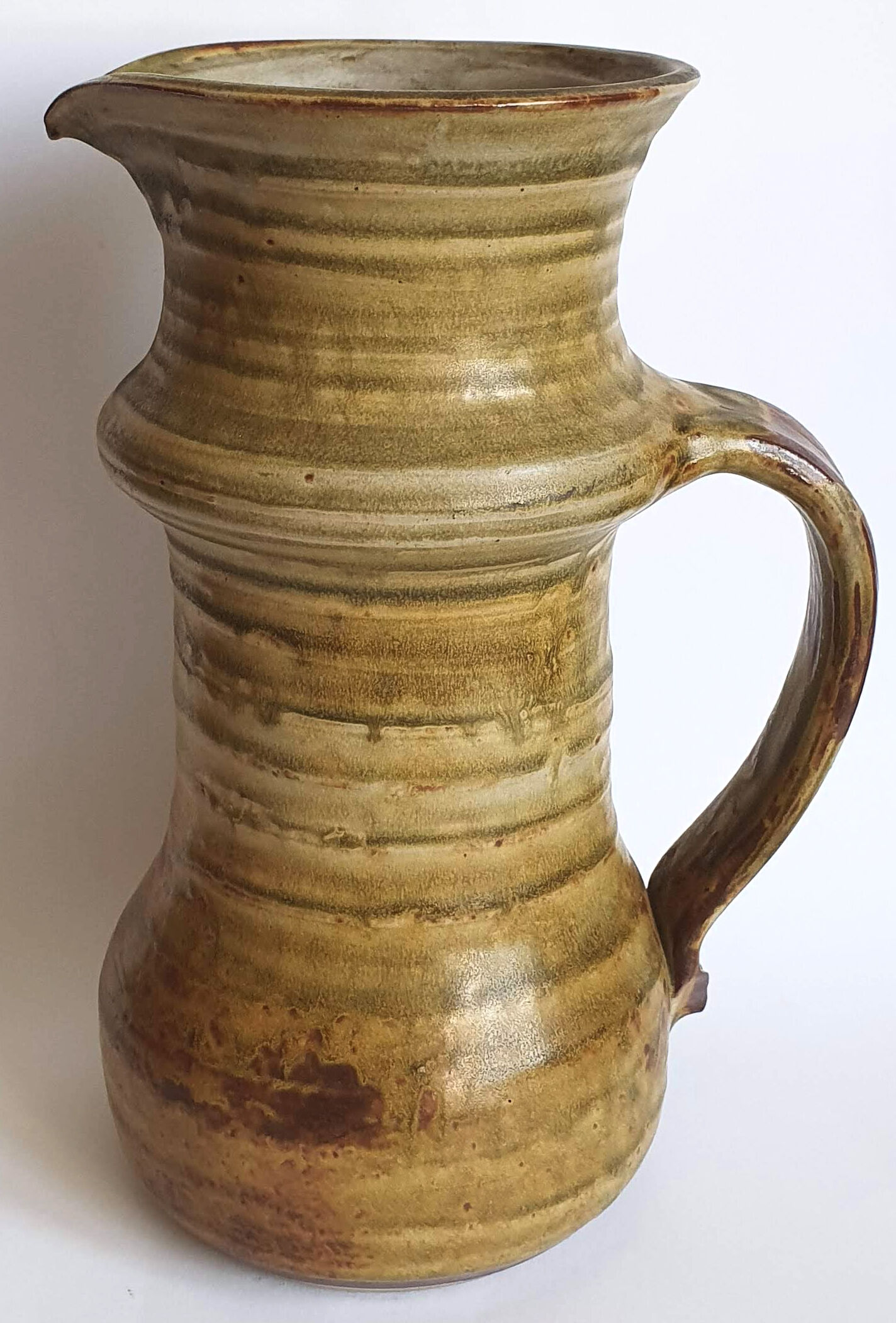 Enamelled sandstone pitcher signed