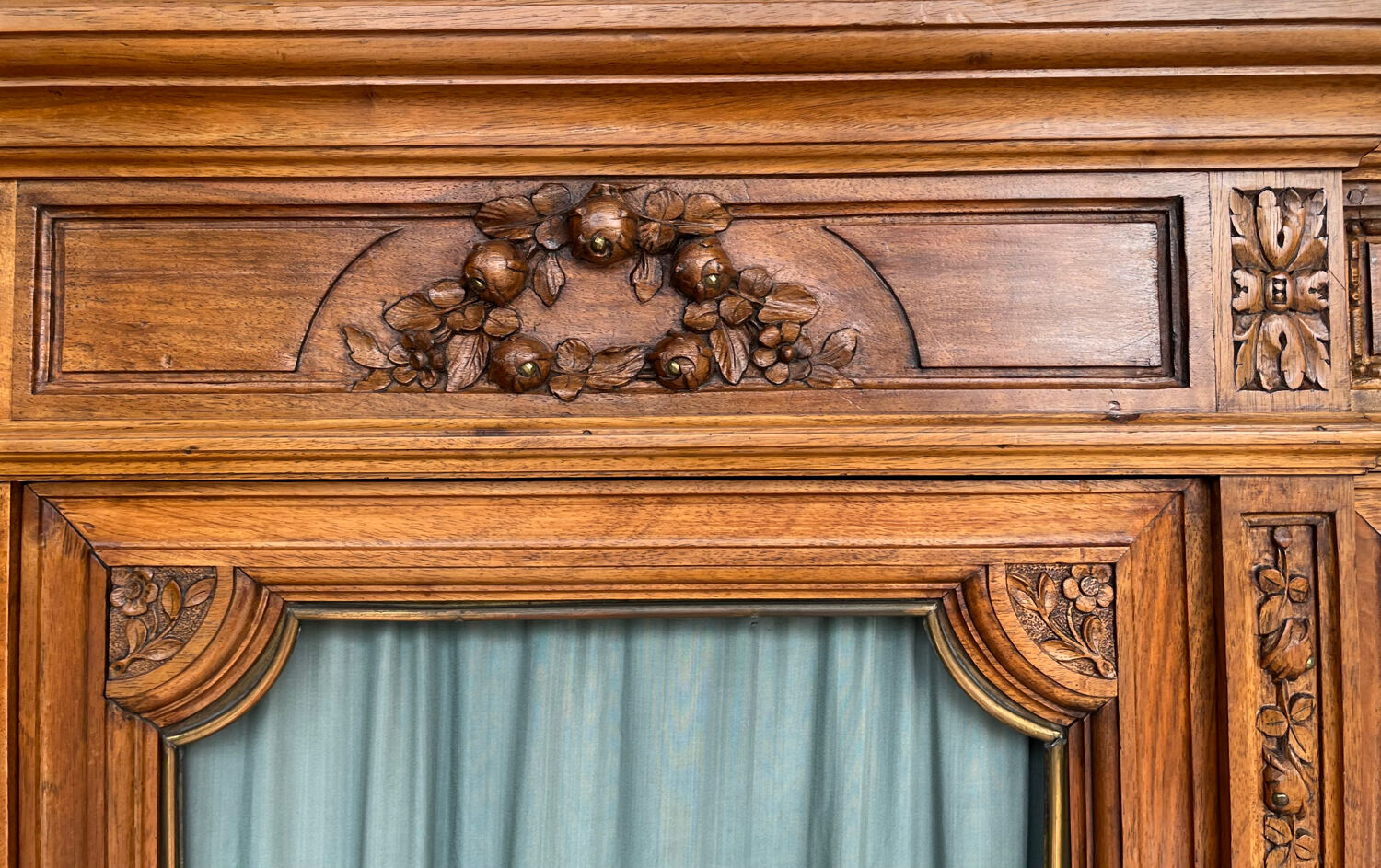 Antique carved wooden bookcase