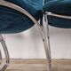 Four 1970s tubular chairs upholstered in blue velvet