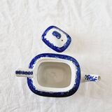 Small porcelain teapot or milk jug with the famous blue willow or weeping pattern