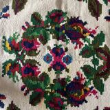 White vintage floral rug made by hand in Romania, beautiful flowers