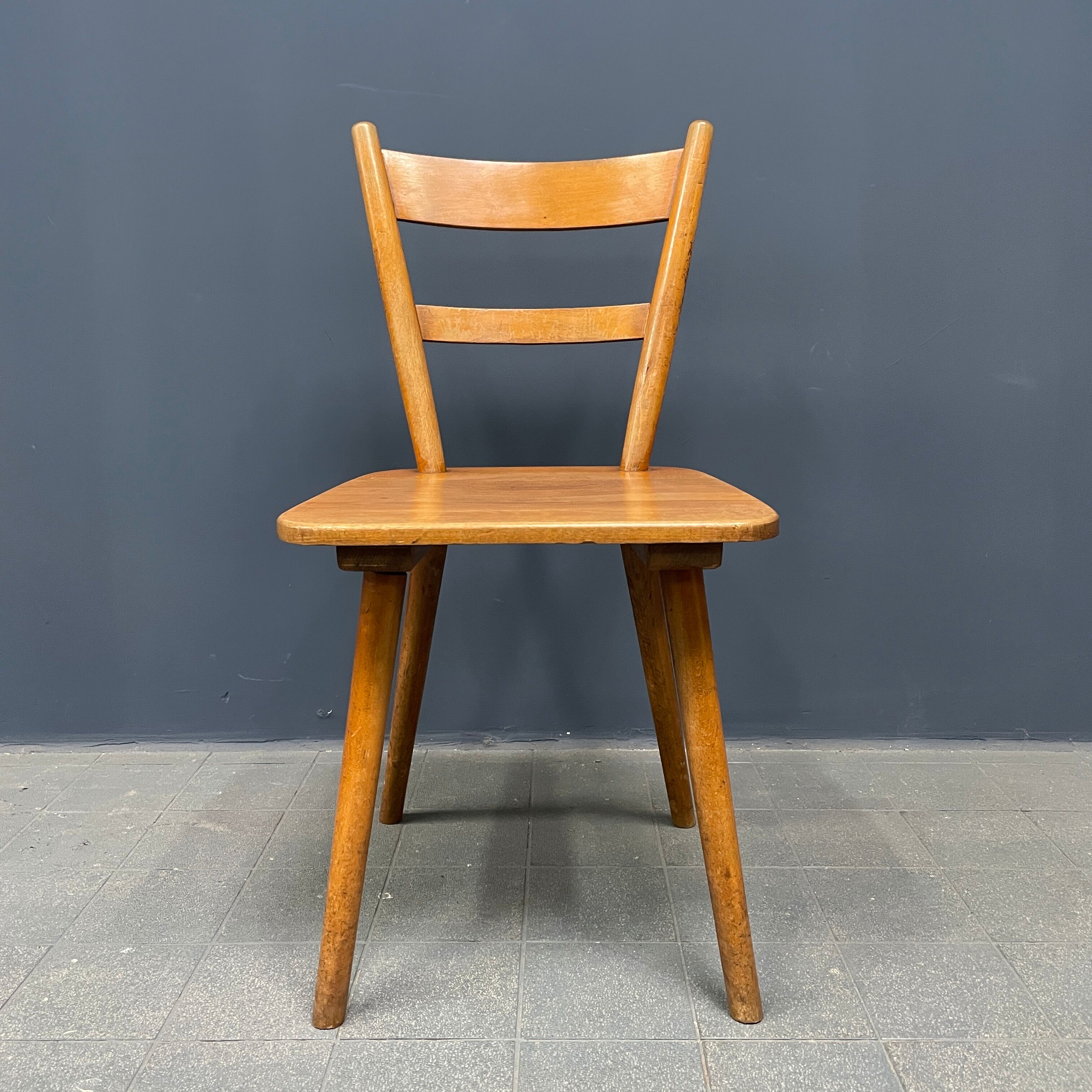 Set of eight german stick chairs from the 1950