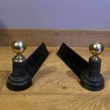 Pair of Napoleon III andirons from the 19th century in cast iron and brass