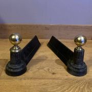 Pair of Napoleon III andirons from the 19th century in cast iron and brass