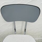 Set of two vintage grey Formica and chrome chairs.