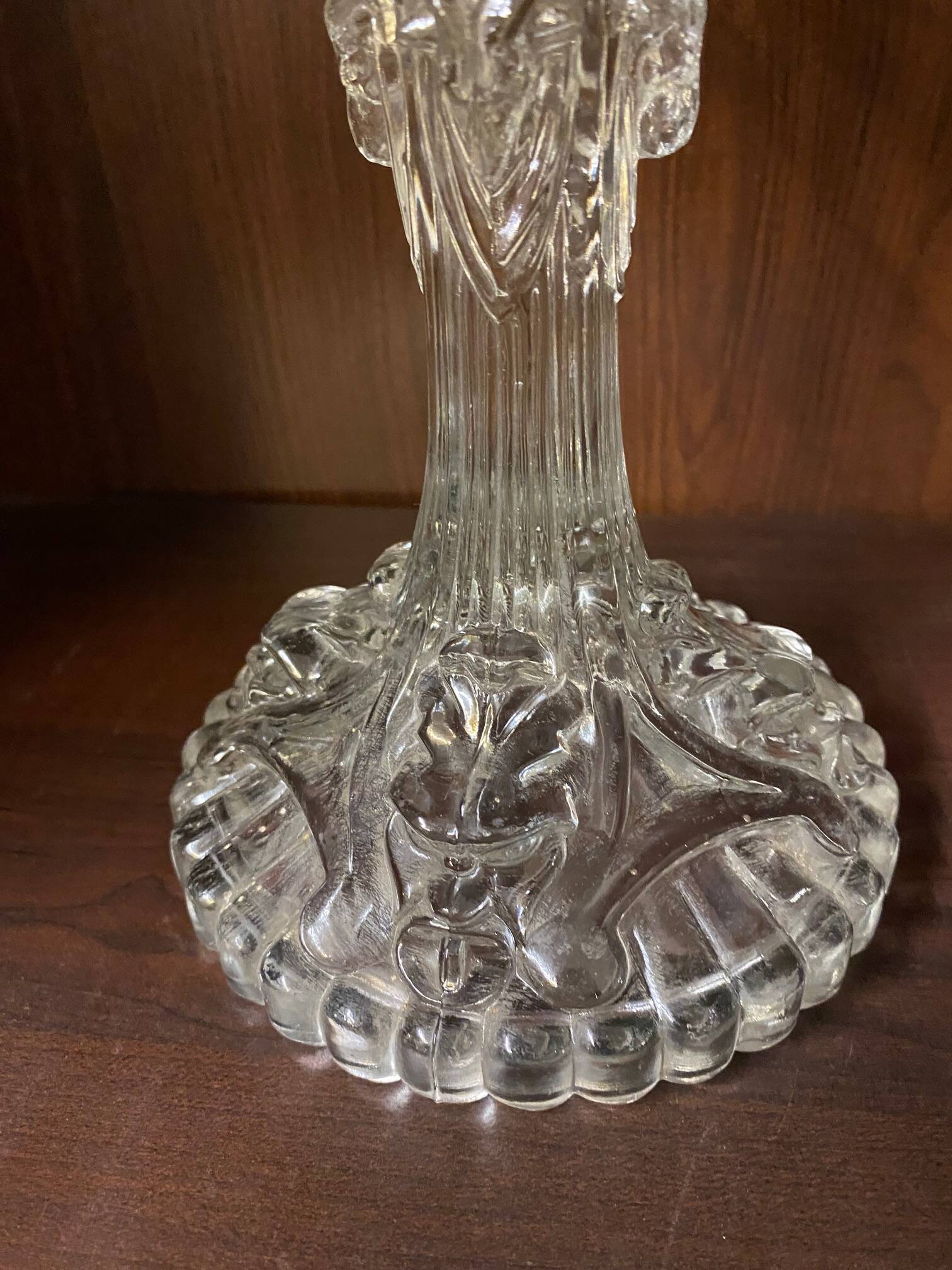 pair of cut glass candlesticks with lion and ram head decor, late 19th century