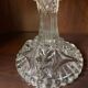 pair of cut glass candlesticks with lion and ram head decor, late 19th century