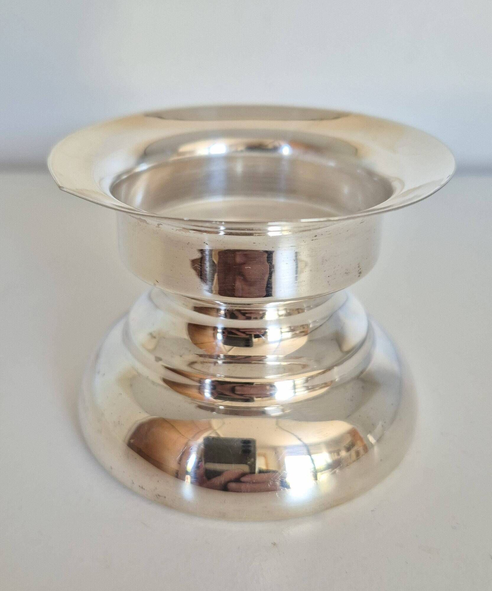 Antique silver candle holder.