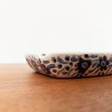 Vintage handmade blue ceramic ashtray with deer and flower ornament from Rodos Ceramics.