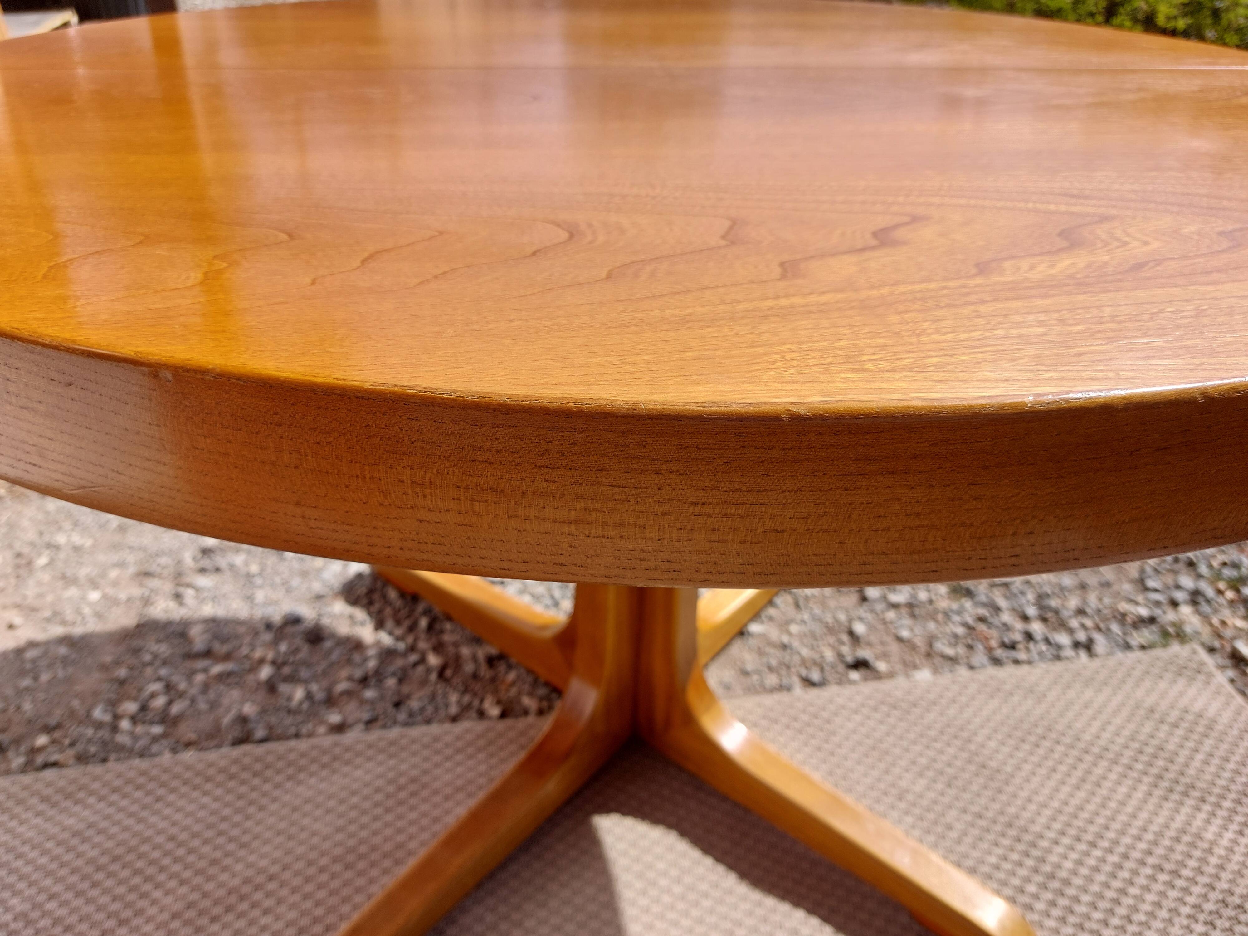 round or oval table with extension, central leg, vintage Baumann design