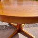 round or oval table with extension, central leg, vintage Baumann design