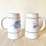 Chopes à bière fleuries en faïence