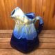 Old vintage blue ceramic pitcher
