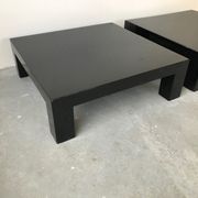 Pair of black laqué wood coffee tables, circa 1970.