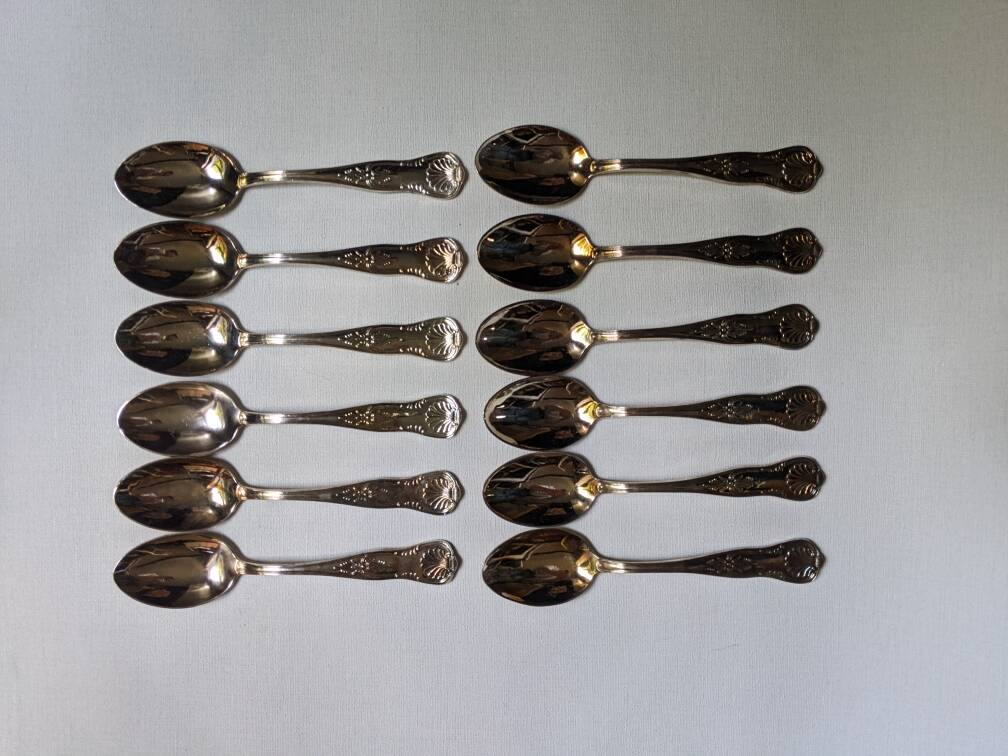 Set of 12 large silver metal spoons, stainless steel, shell