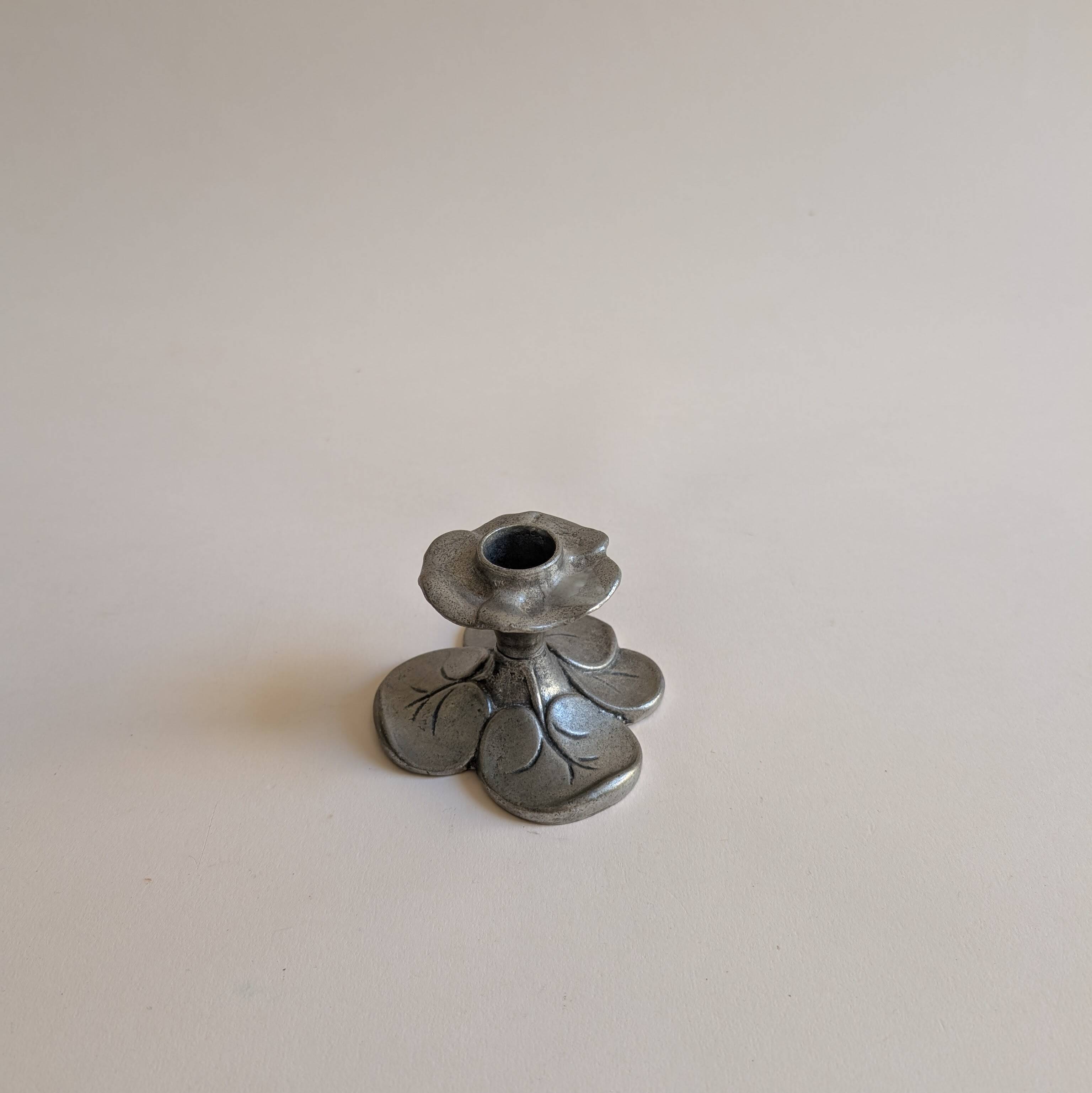 Tin candle holder