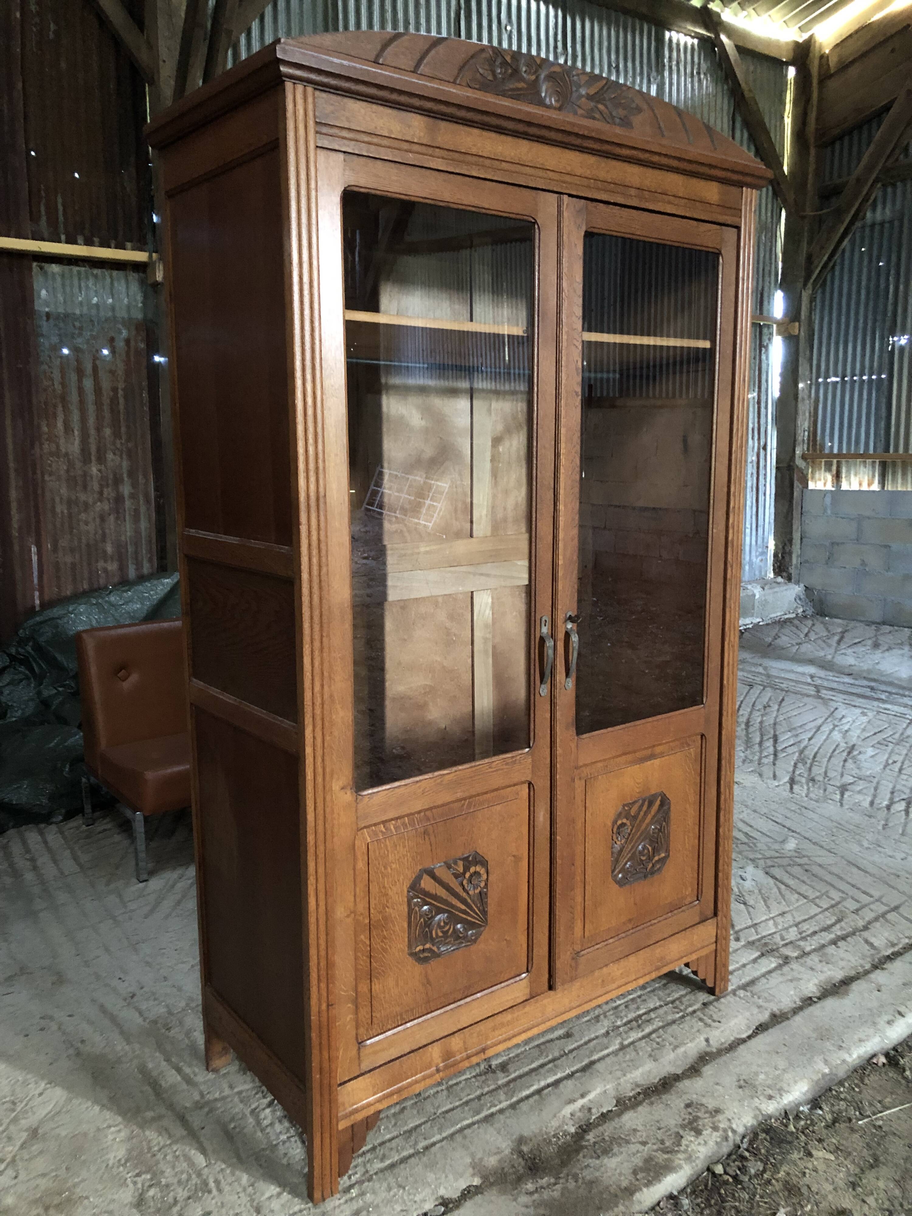 Vintage rococo oak bookcase with 2 glass doors.