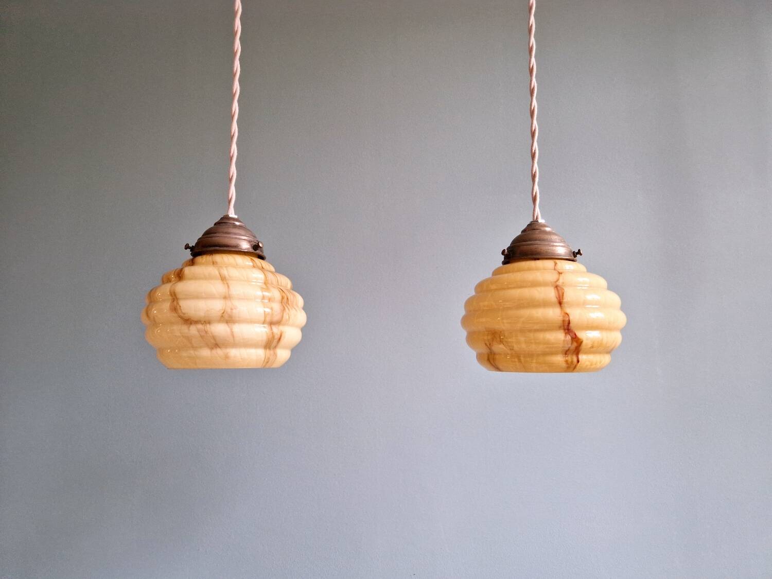 Pair of Art Deco marbled opaline pendant lights, 1920s-30s