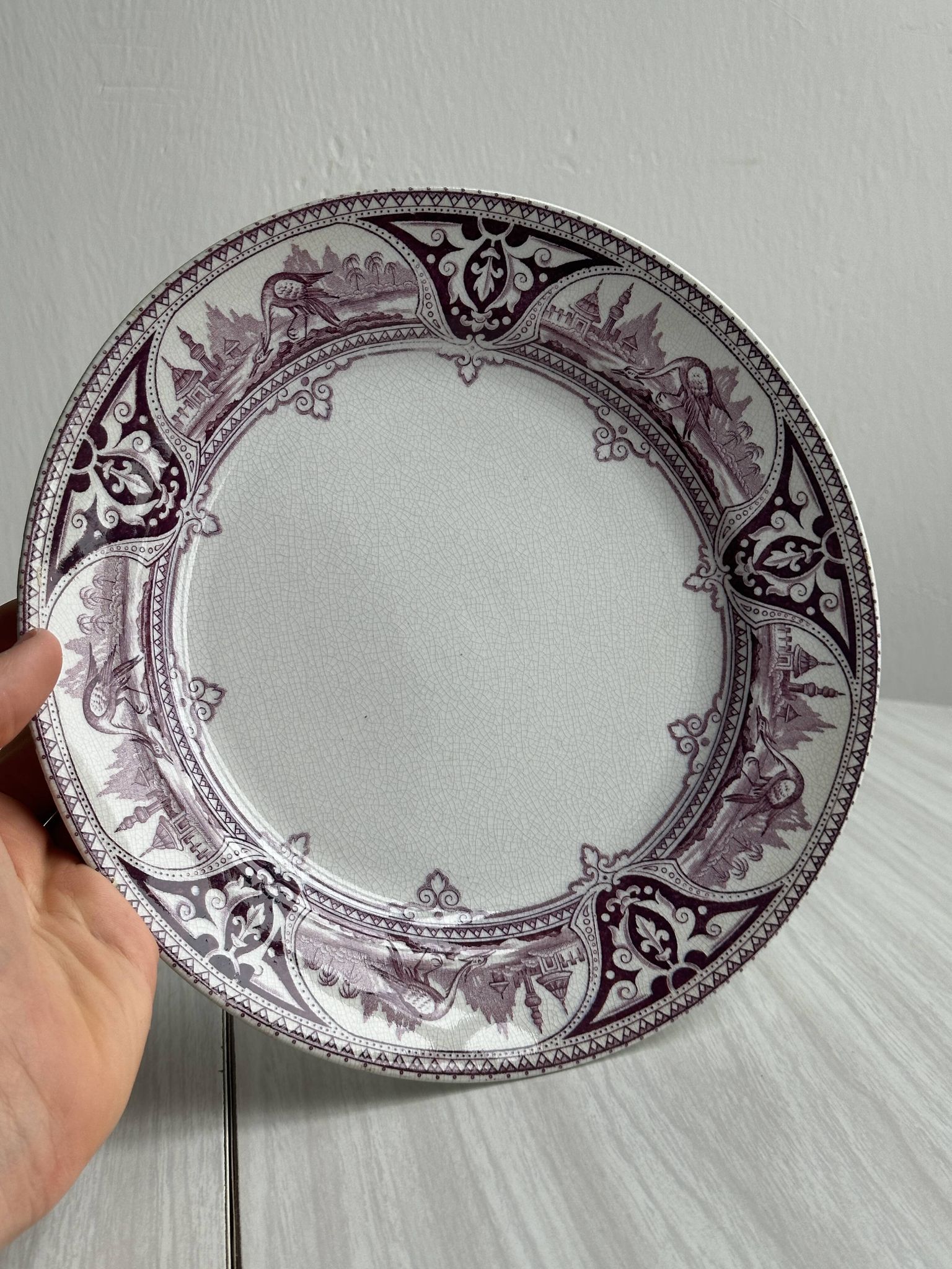 Antique plate with purple oriental decoration