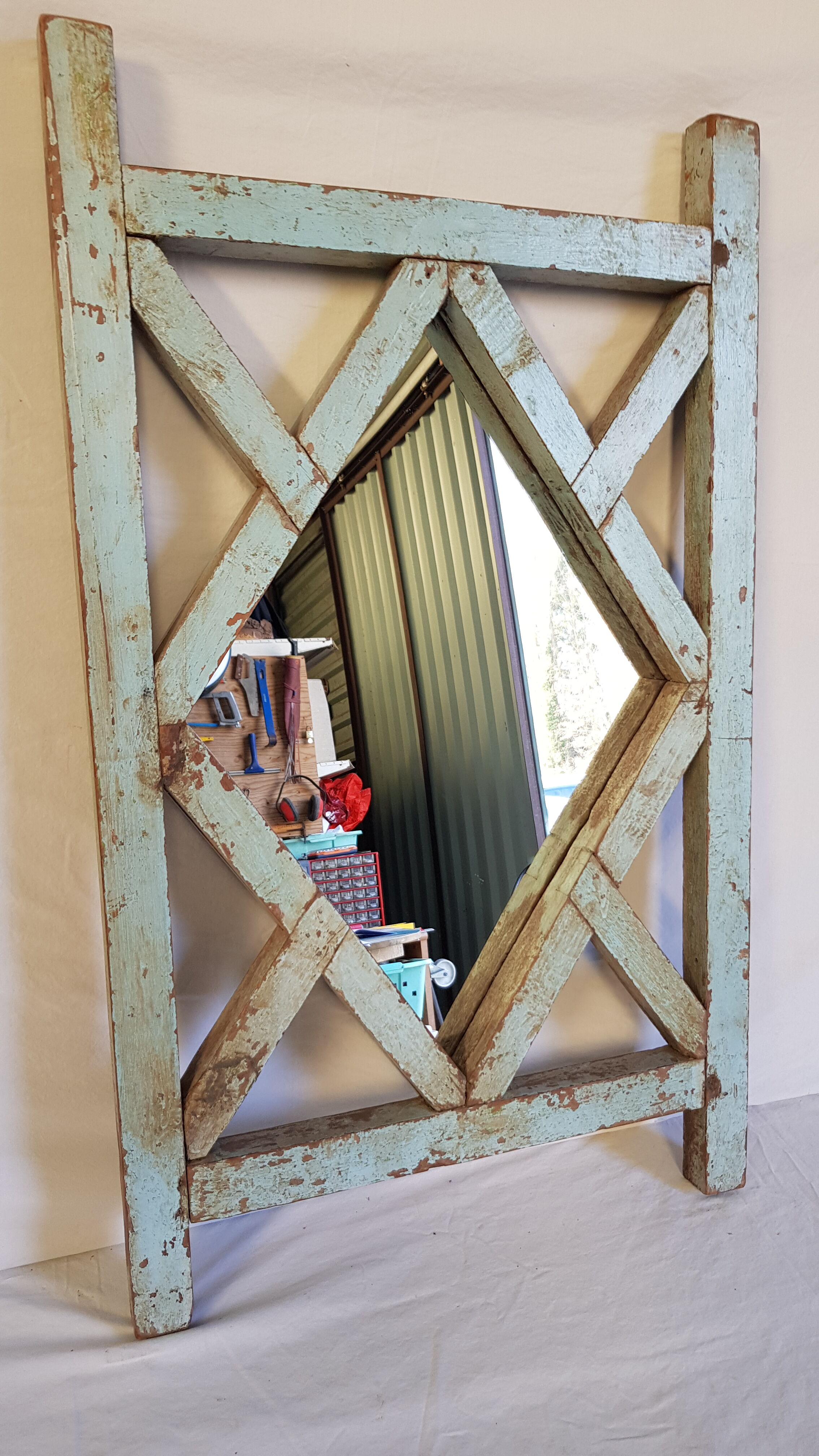 Old mirror claustras in Burmese teak