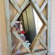 Old mirror claustras in Burmese teak
