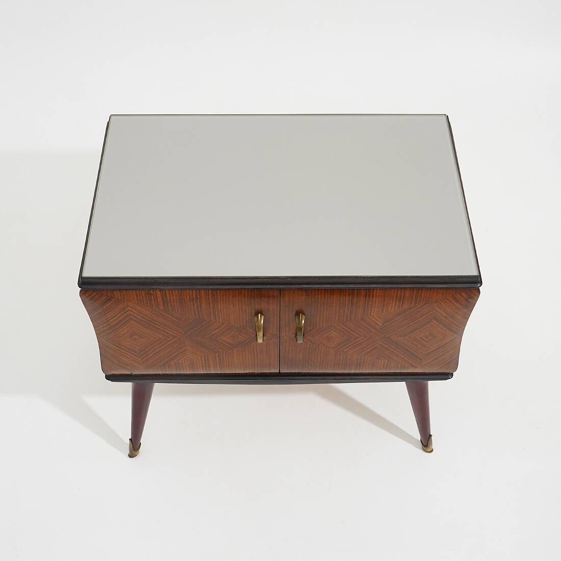 Pair of bedside tables with glass top, 1950s